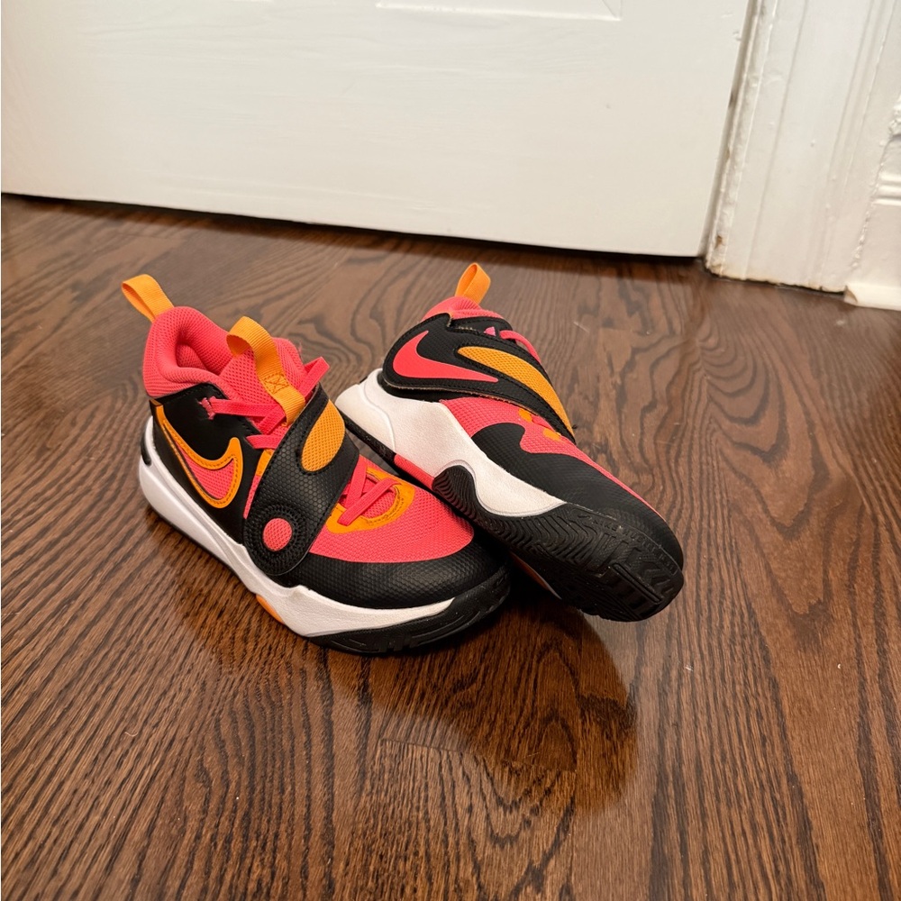 Nike Kids' Team Hustle D11 Black, Red, and Orange Sneakers